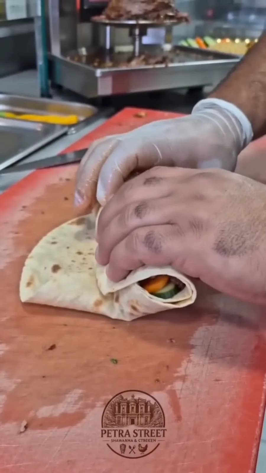 A shawarma being rolled by hand at Petra Street